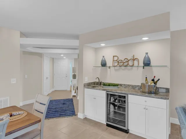 a kitchen with a stove and cabinets