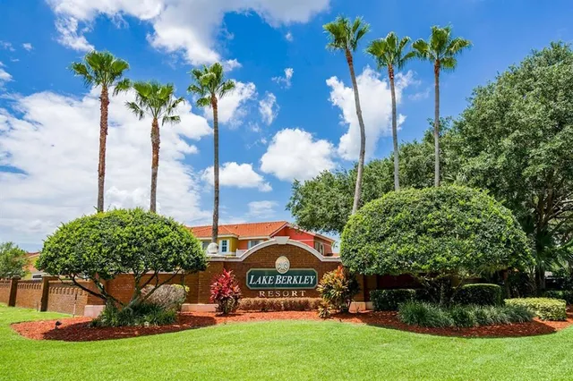 a view of a park with a flower garden