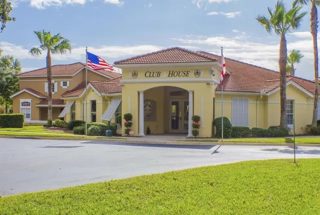 a front view of a house with swimming pool