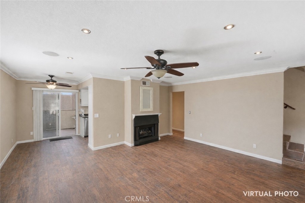 400 South Flower, Unit 99 Orange, CA 92868 - Photo 3 of 14 a view of an empty room with a fireplace