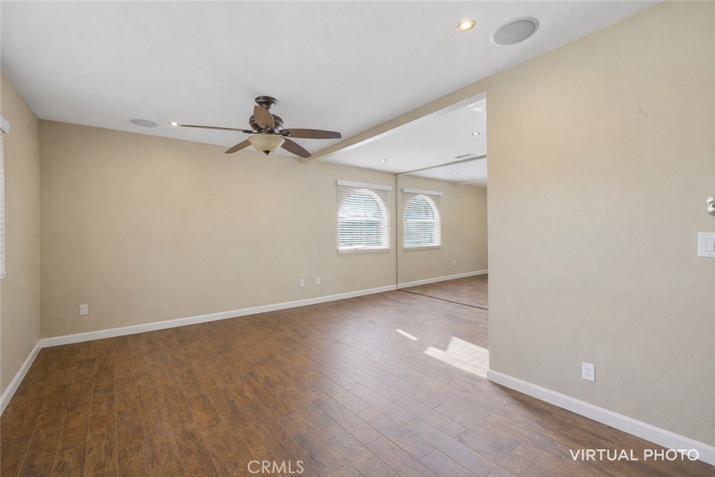 400 South Flower, Unit 99 Orange, CA 92868 - Photo 7 of 14 wooden floor in an empty room with a window