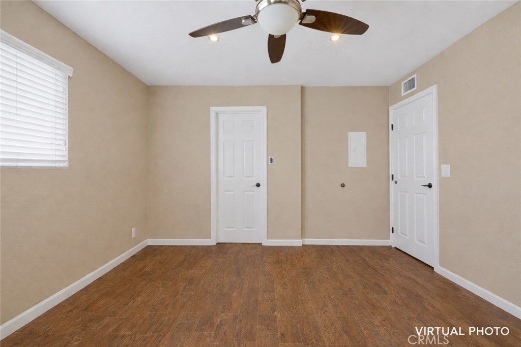 400 South Flower, Unit 99 Orange, CA 92868 - Photo 9 of 14 wooden floor in an empty room with a window