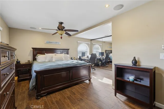 a living room with furniture fireplace and flat screen tv