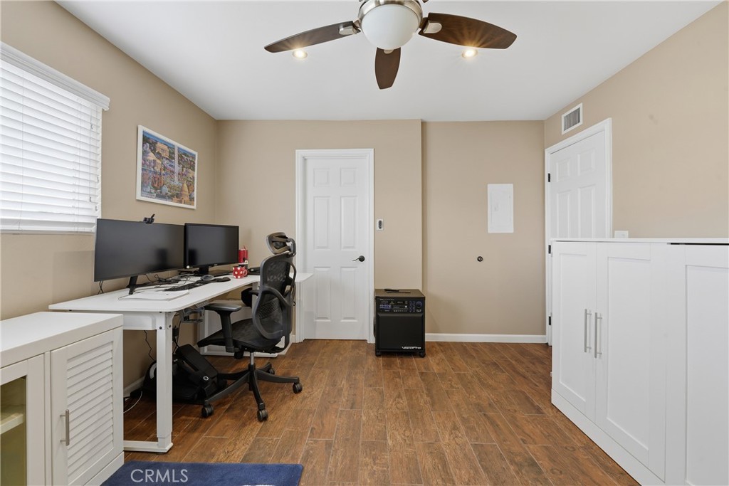 400 South Flower, Unit 99 Orange, CA 92868 - Photo 10 of 14 a view of a workspace with furniture and a window