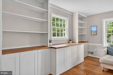 a kitchen with a sink and a window
