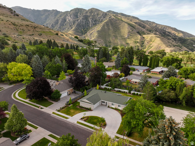 1774 Country Club Drive Logan, UT 84321 - Photo 25 of 28 Ranch-style residence featuring a green asphalt shingle roof and light-toned siding