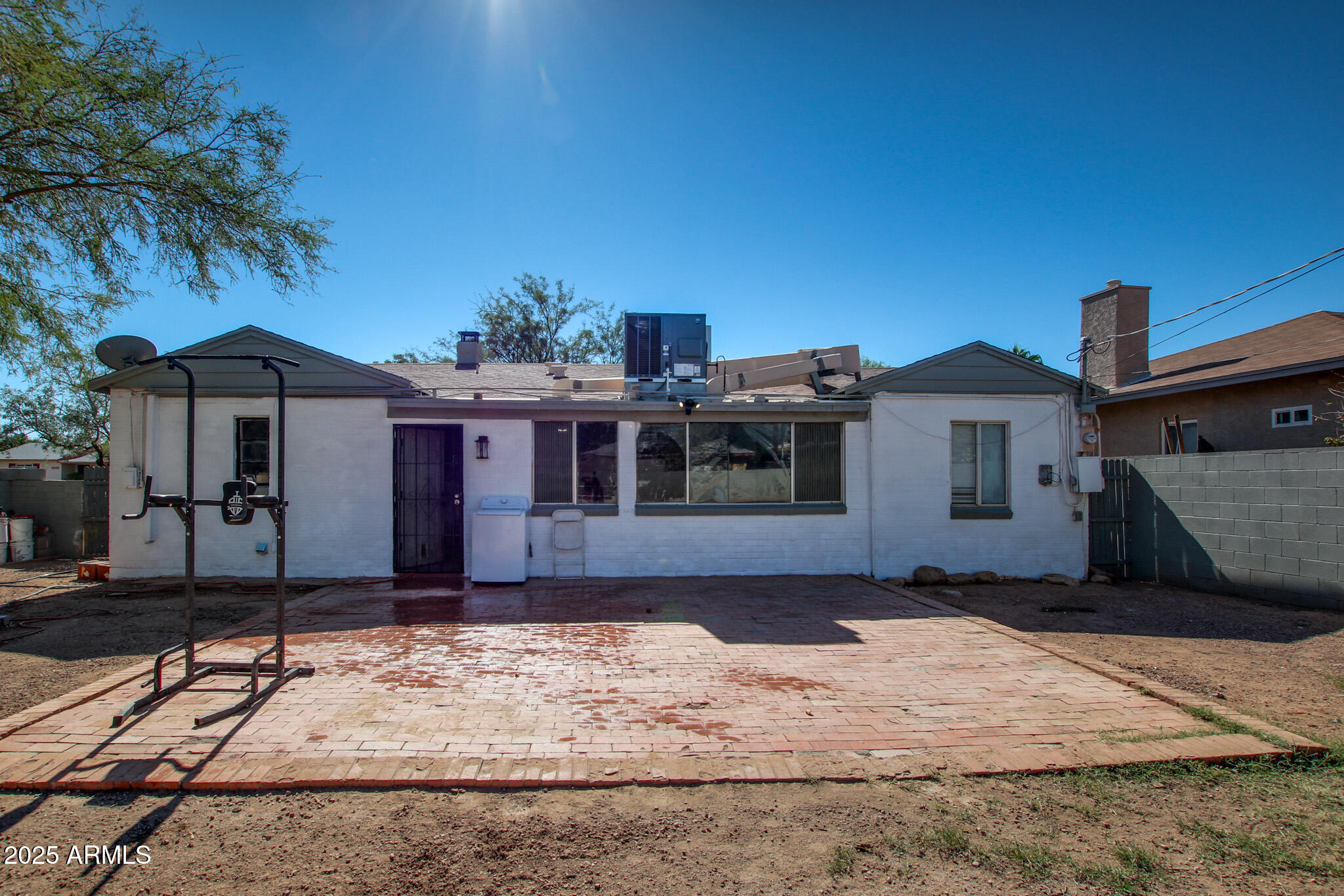 3273 East 27th Street Tucson, AZ 85713 - Photo 29 of 39 a front view of a house with a yard