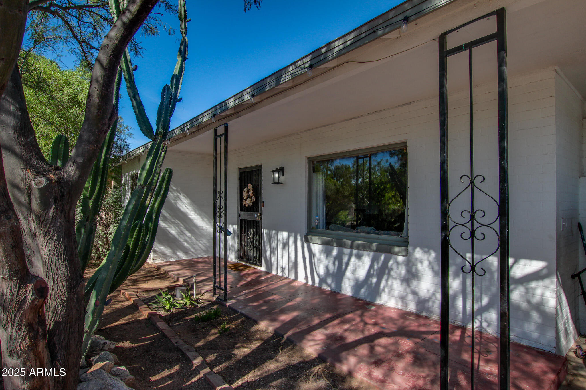3273 East 27th Street Tucson, AZ 85713 - Photo 8 of 39 a view of a house with backyard and sitting area