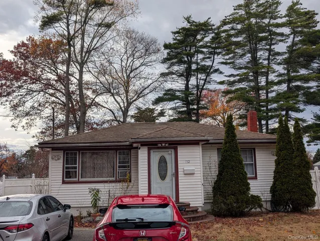 a car parked in front of a house
