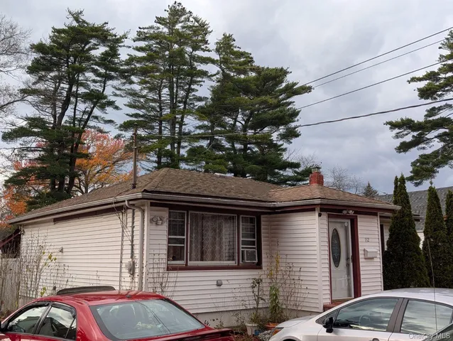 a bedroom with a bed and furniture