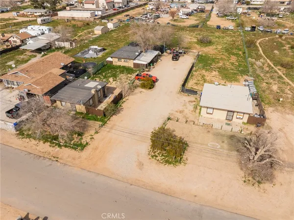 an aerial view of residential building with ocean view