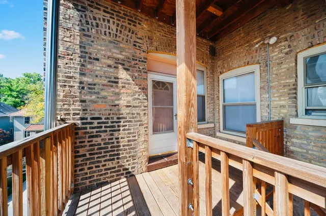 a view of a door and wooden door