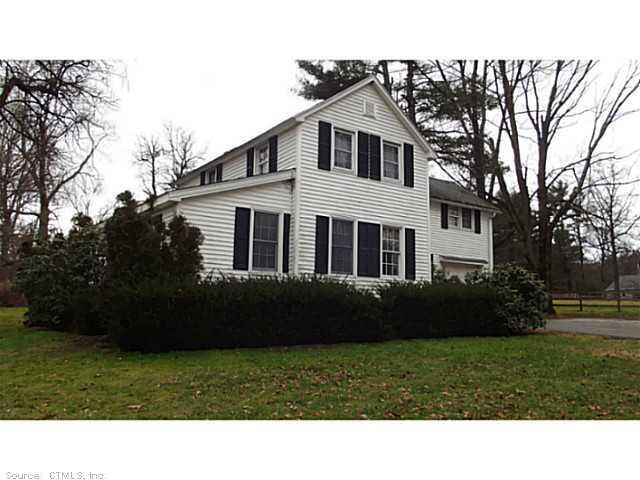 a black and white photo of a house