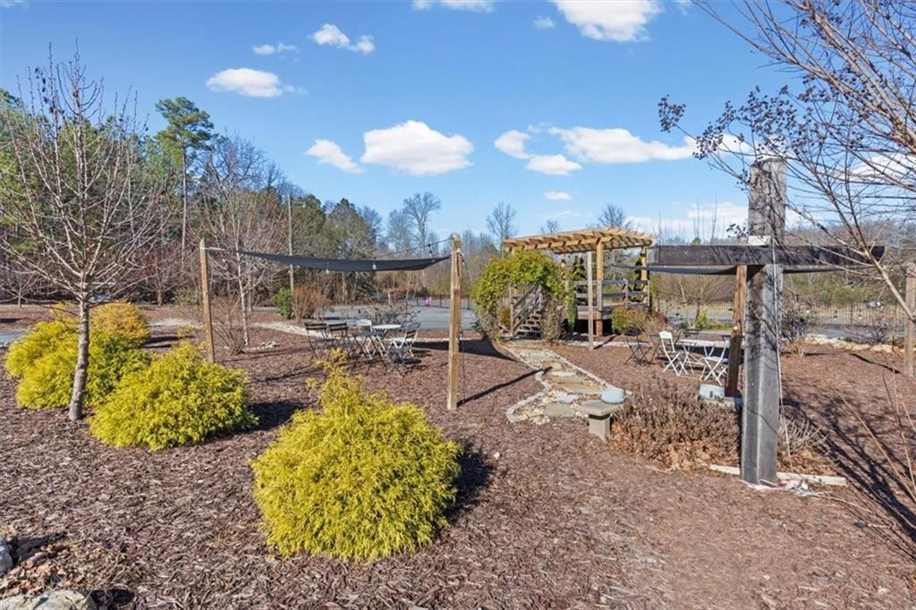 250 Crowe Springs Road Northwest Cartersville, GA 30121 - Photo 68 of 81 a view of a swimming pool with a patio