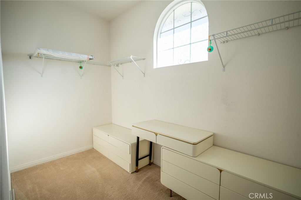 13208 Firestone Drive Rancho Cucamonga, CA 91739 - Photo 16 of 21 a bathroom with a window and a shower