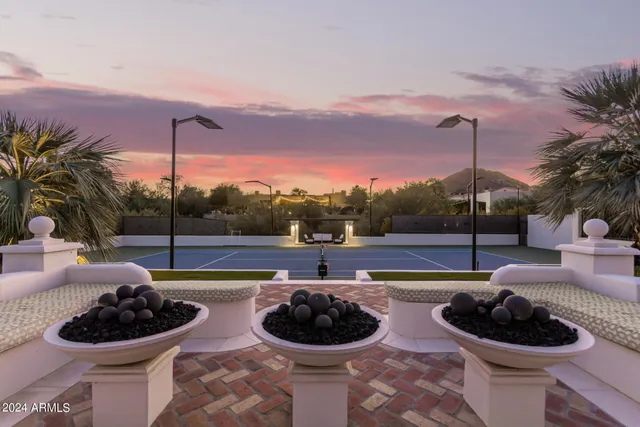 a outdoor living space with furniture and city view