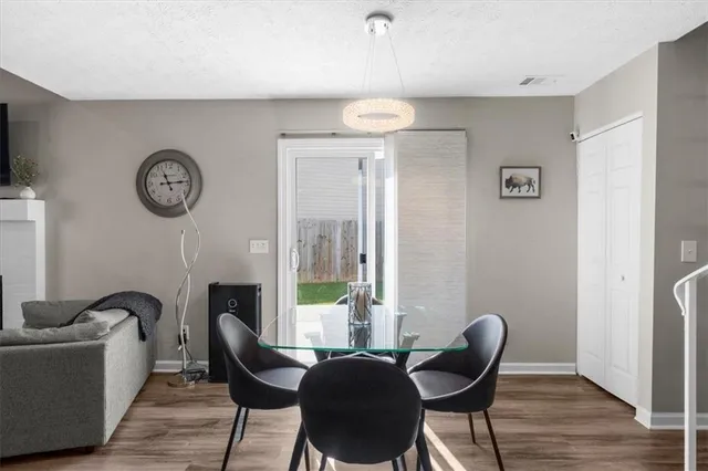 a view of a livingroom with furniture and a chair