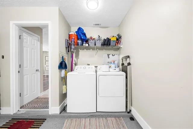 a storage room with washer and dryer