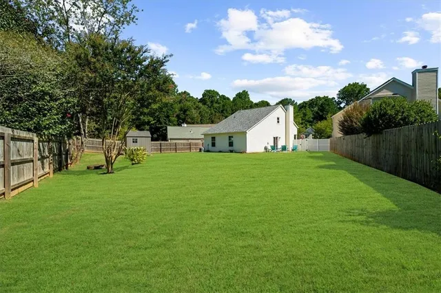 a house view with a garden space