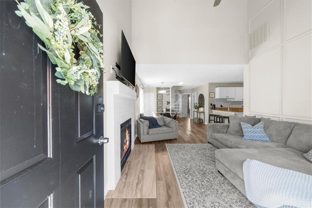 820 Camelon Court Alpharetta, GA 30004 - Photo 4 of 33 a living room with furniture and a potted plant