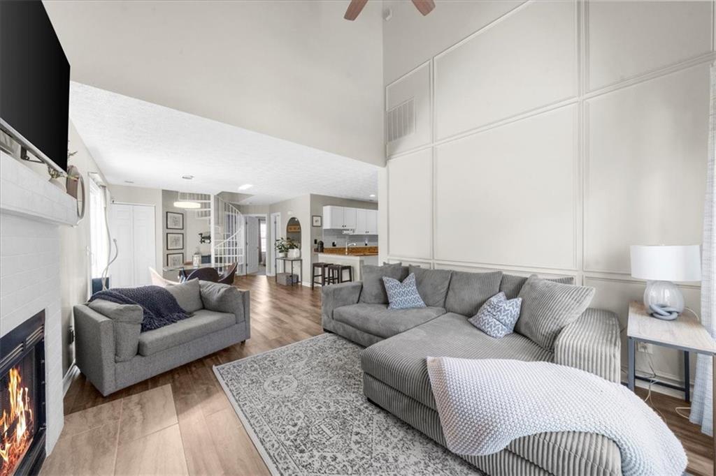 820 Camelon Court Alpharetta, GA 30004 - Photo 5 of 33 a living room with furniture and a couch