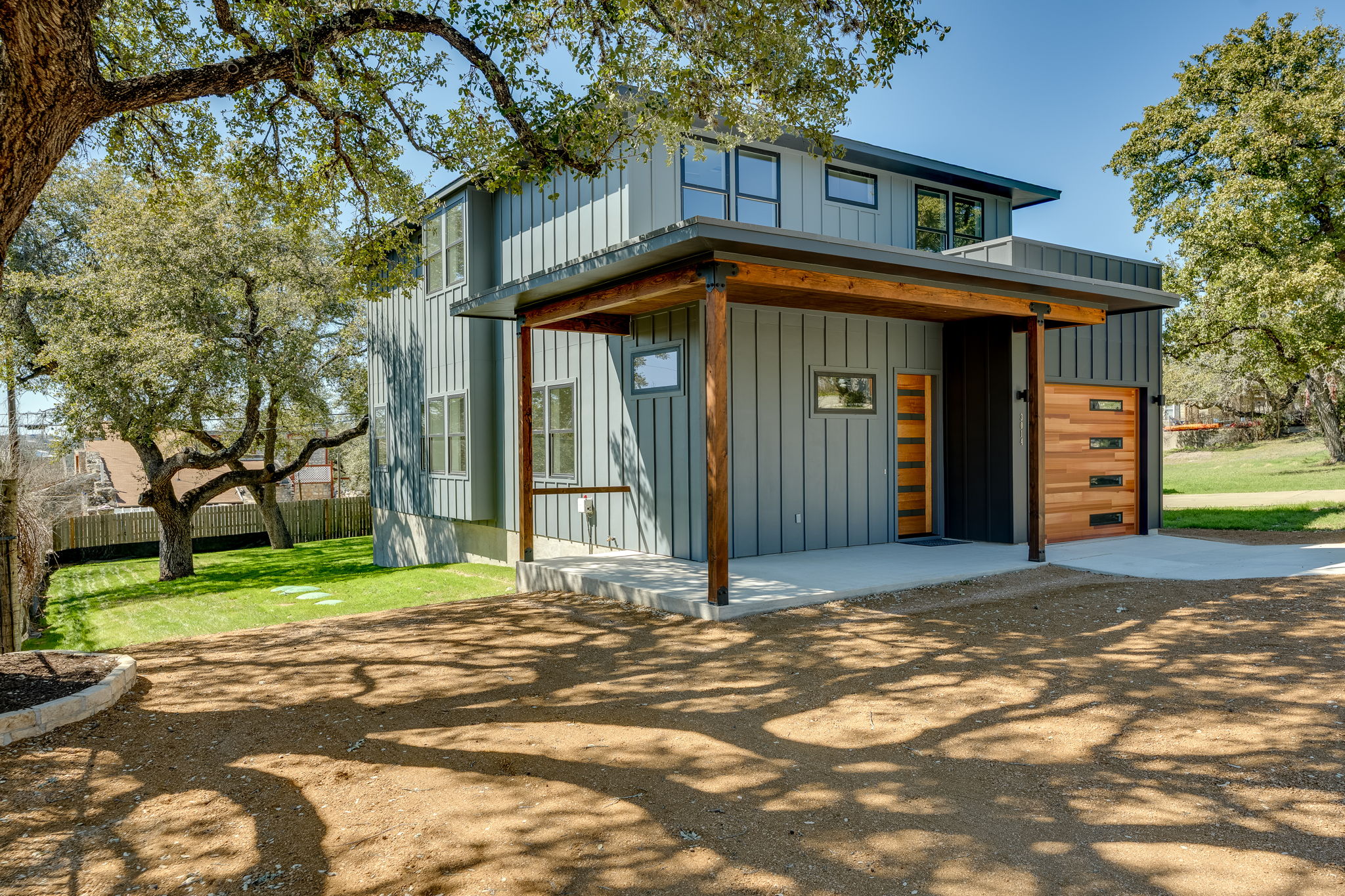 3014 Brass Buttons Trail Austin, TX 78734 - Photo 35 of 35 Enjoy your enclosed garage and lots of extra low maintenance parking space created with crushed granite.