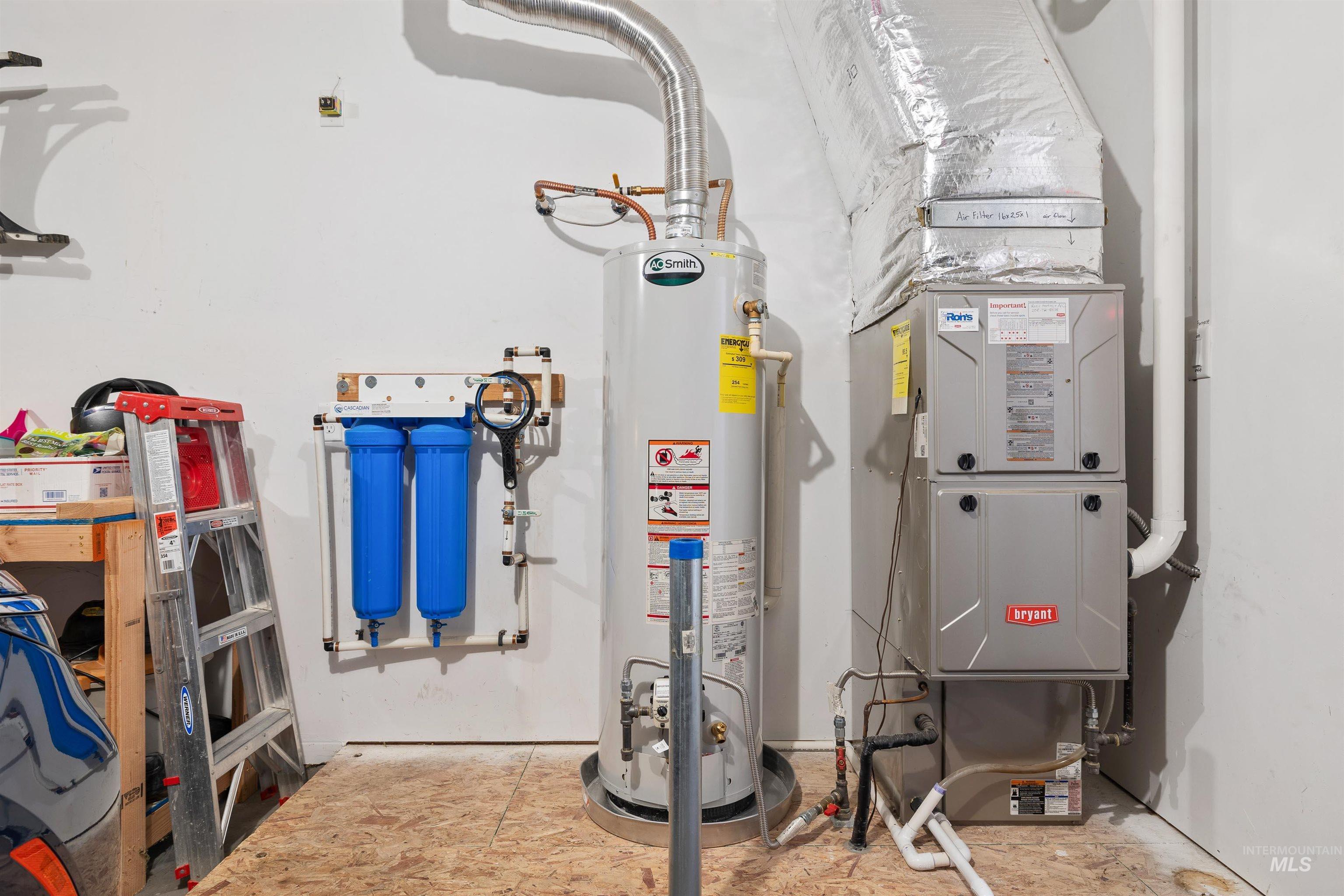 330 Arrowhead Path Twin Falls, ID 83301 - Photo 21 of 37 Utility room with water heater and heating unit