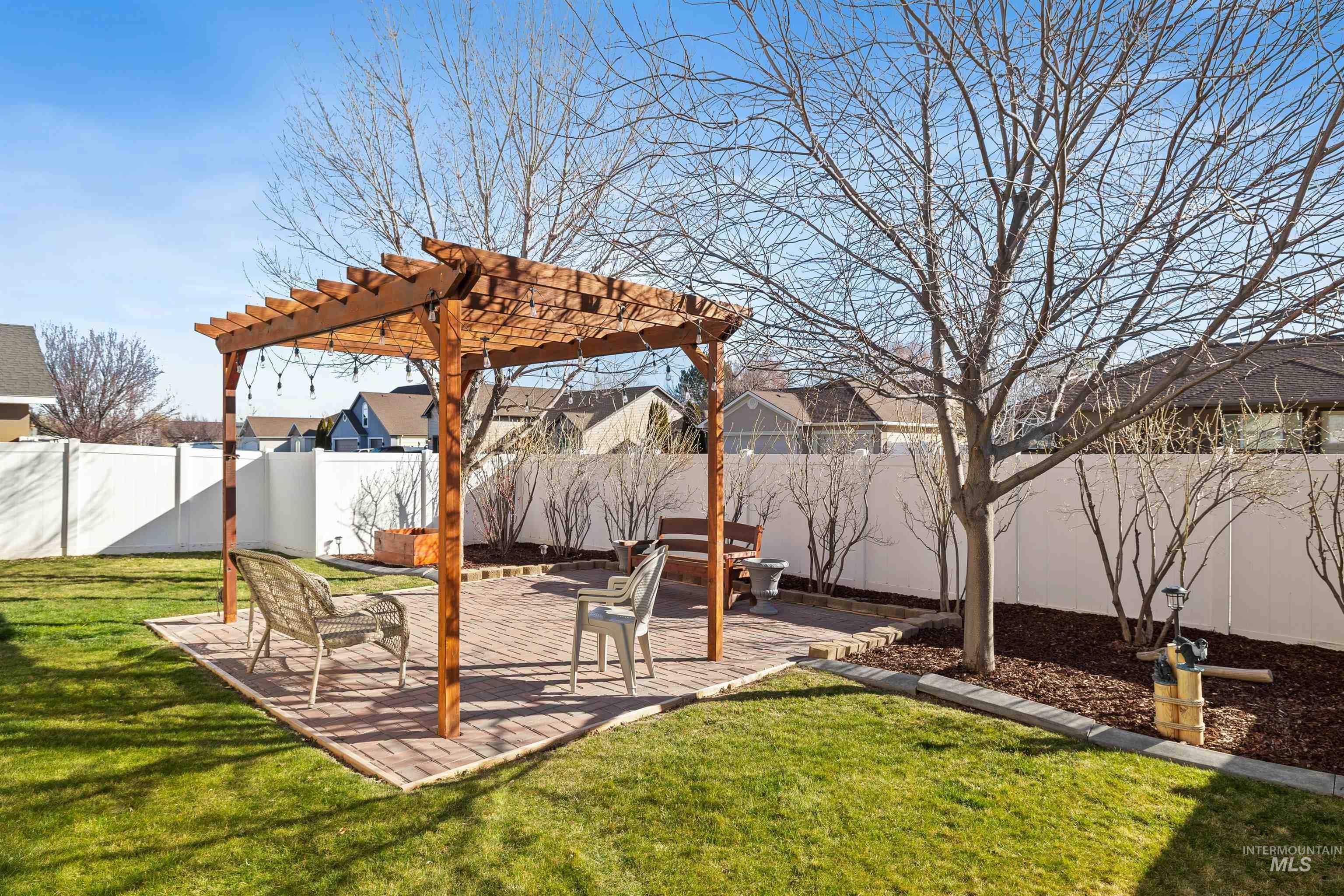 330 Arrowhead Path Twin Falls, ID 83301 - Photo 22 of 37 Fenced backyard featuring a patio and a pergola