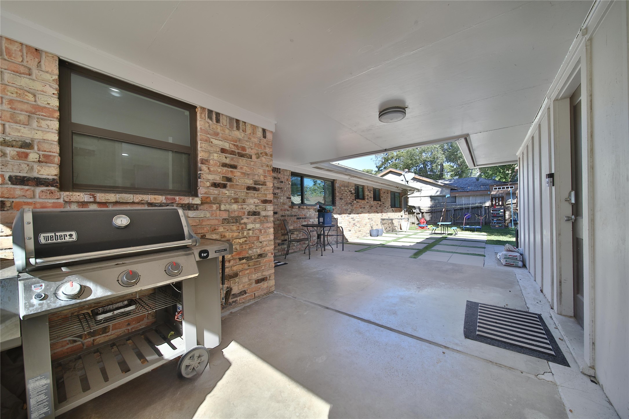 4402 Fallbrook Drive Houston, TX 77018 - Photo 8 of 29 Covered patio provides additional outdoor living space and backyard access