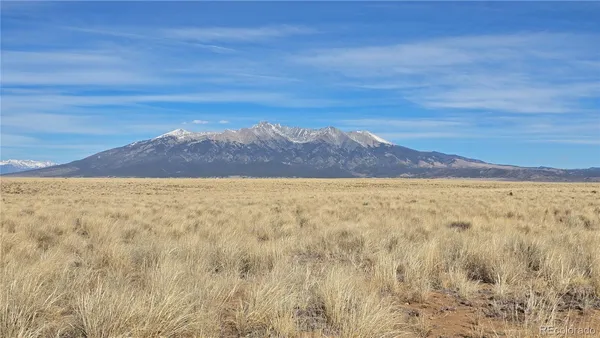 a view of ocean and a mountain