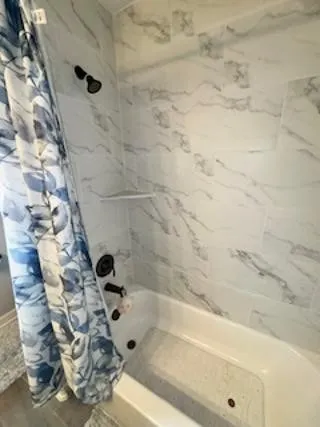 a bathroom with a bathtub