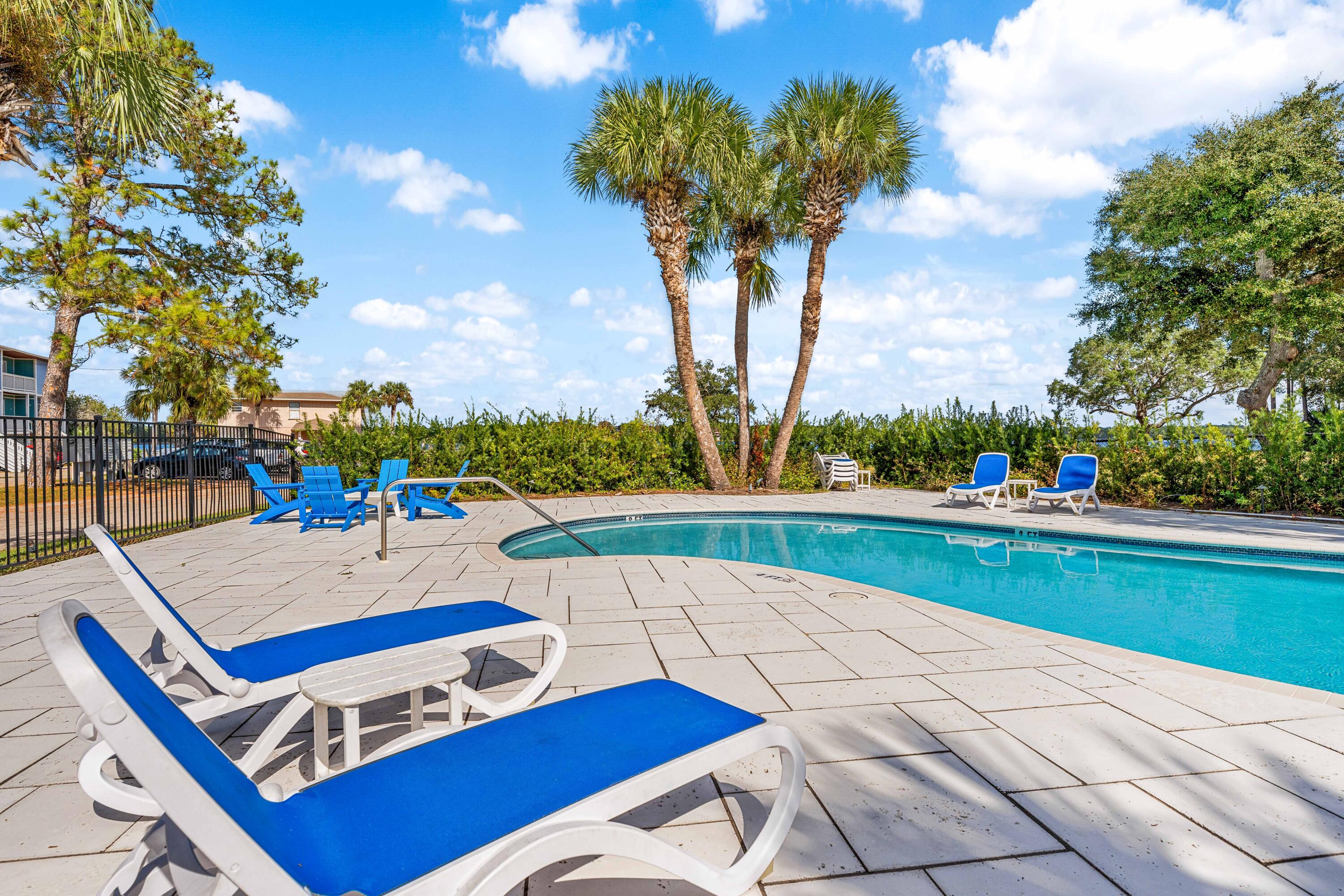 101 Cain Road, Unit O Panama City Beach, FL 32413 - Photo 24 of 29 a view of yard from terrace with seating space