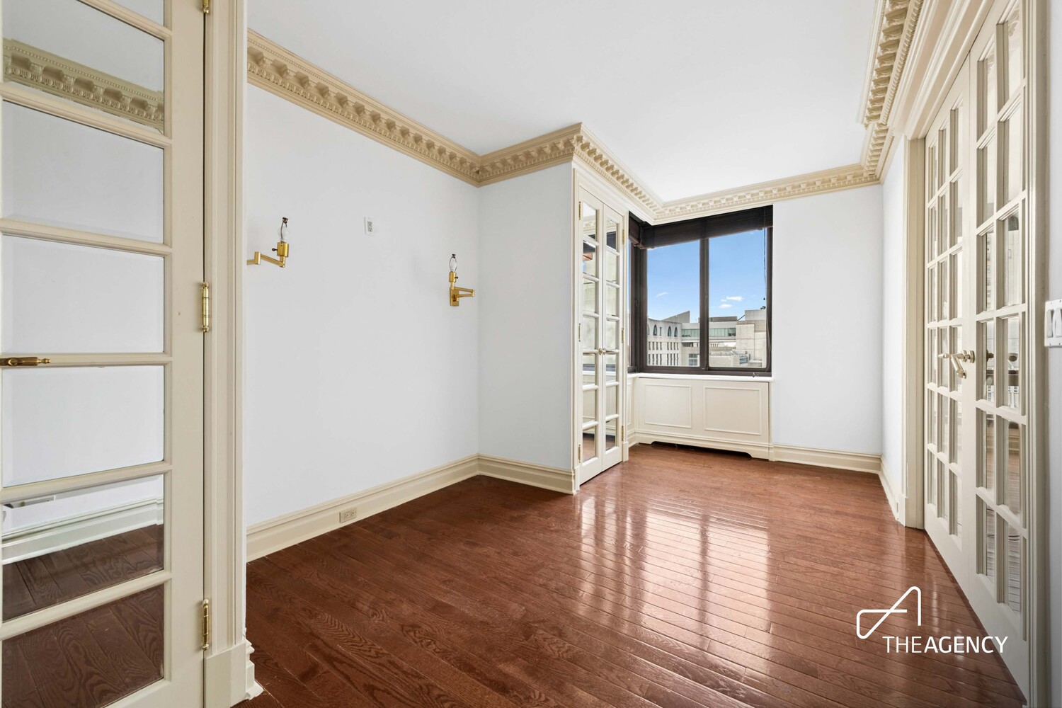 524 East 72nd Street, Unit 22D Manhattan, NY 10021 - Photo 3 of 12 a view of an entryway with wooden floor