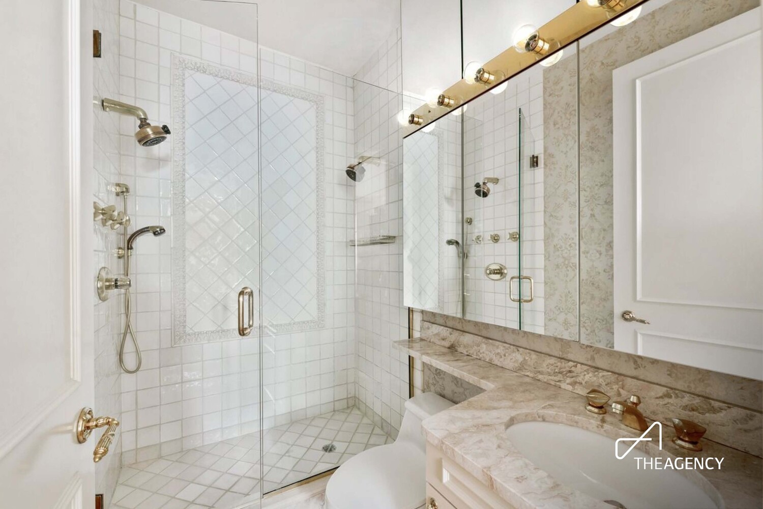 524 East 72nd Street, Unit 22D Manhattan, NY 10021 - Photo 9 of 12 a bathroom with a sink toilet and shower