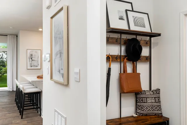 a view of hallway that has closet