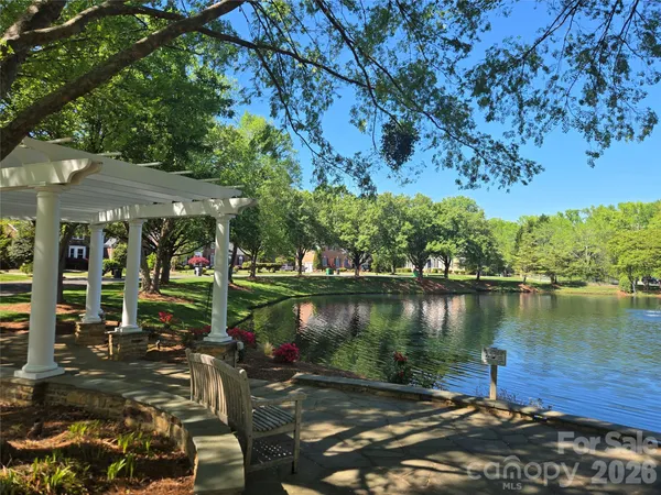 a lake view with a sitting space