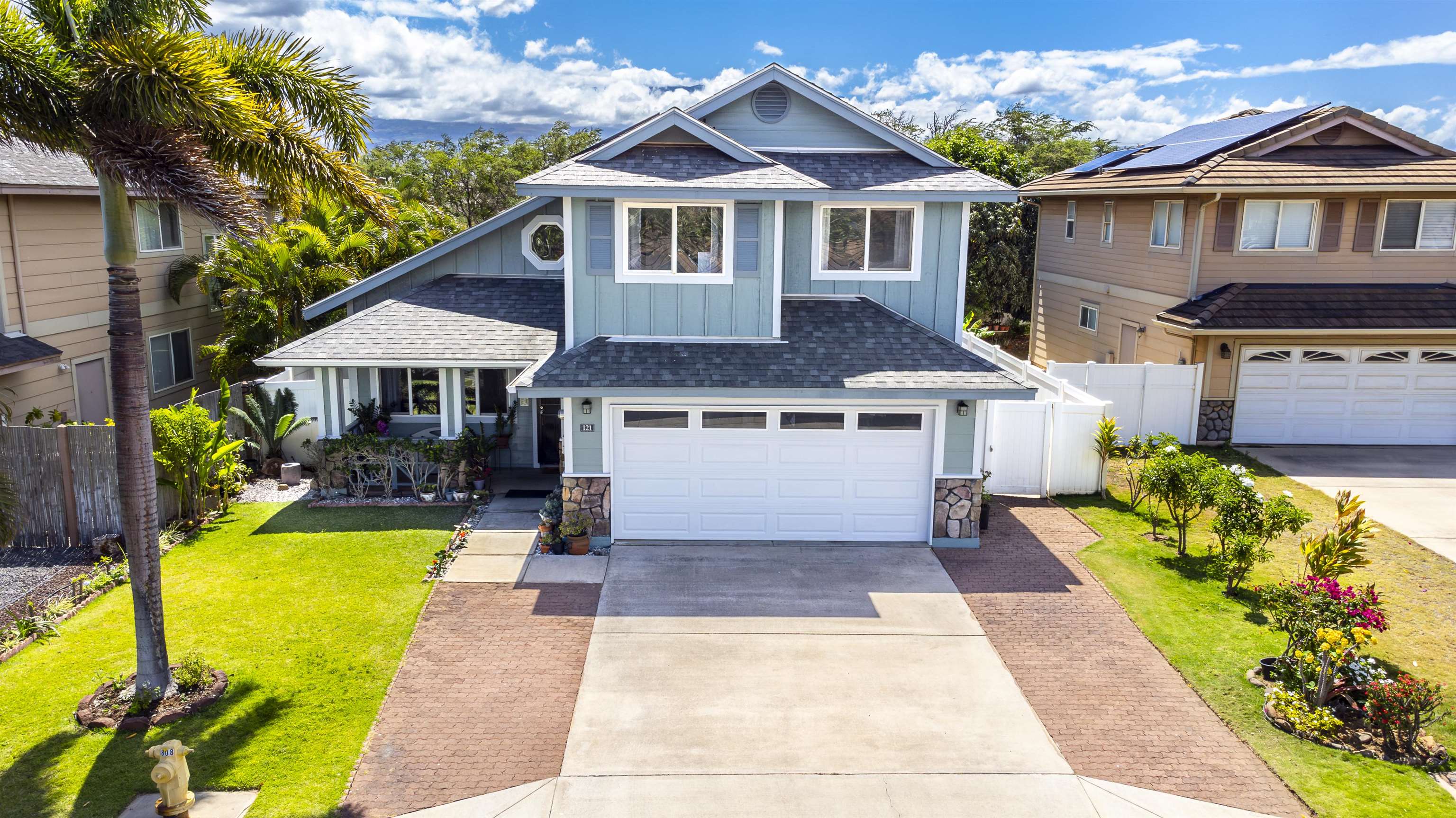 a front view of a house with swimming pool