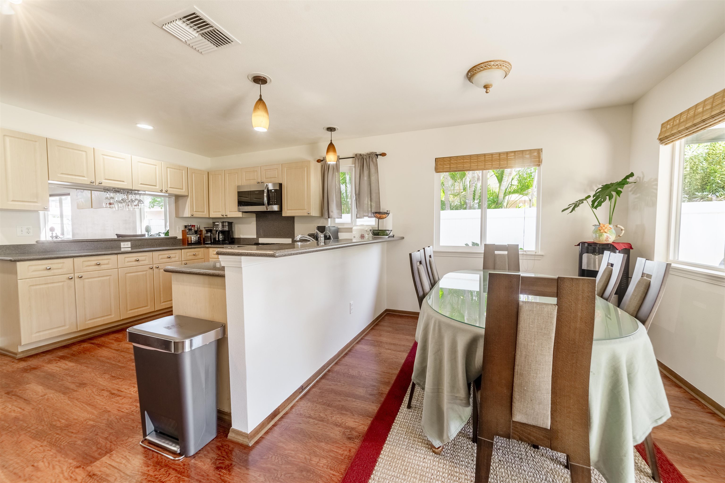121 Molehulehu Loop Kahului, HI 96732 - Photo 14 of 43 a dining room with furniture and a kitchen view