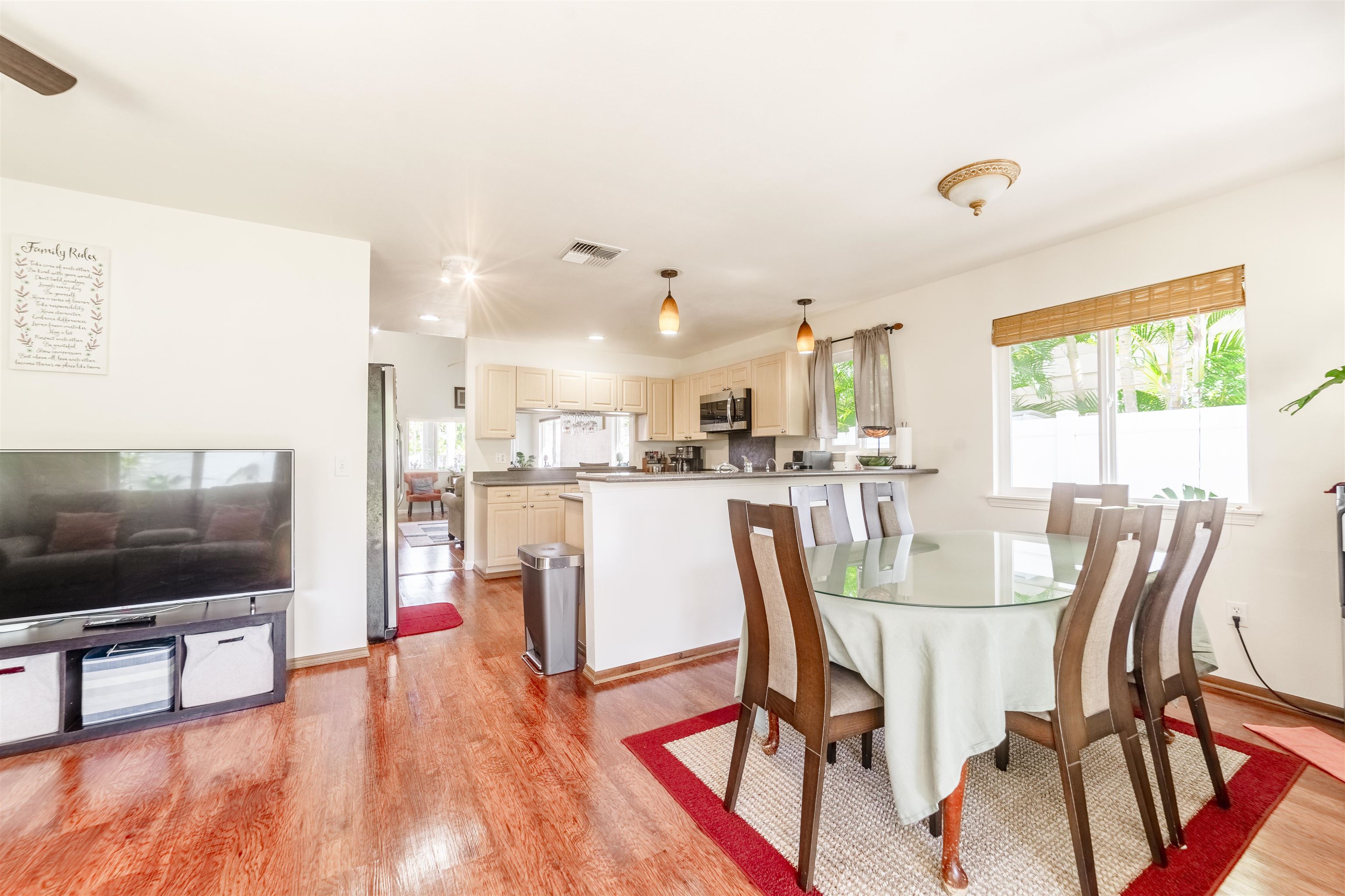 121 Molehulehu Loop Kahului, HI 96732 - Photo 15 of 43 a dining room with furniture and wooden floor