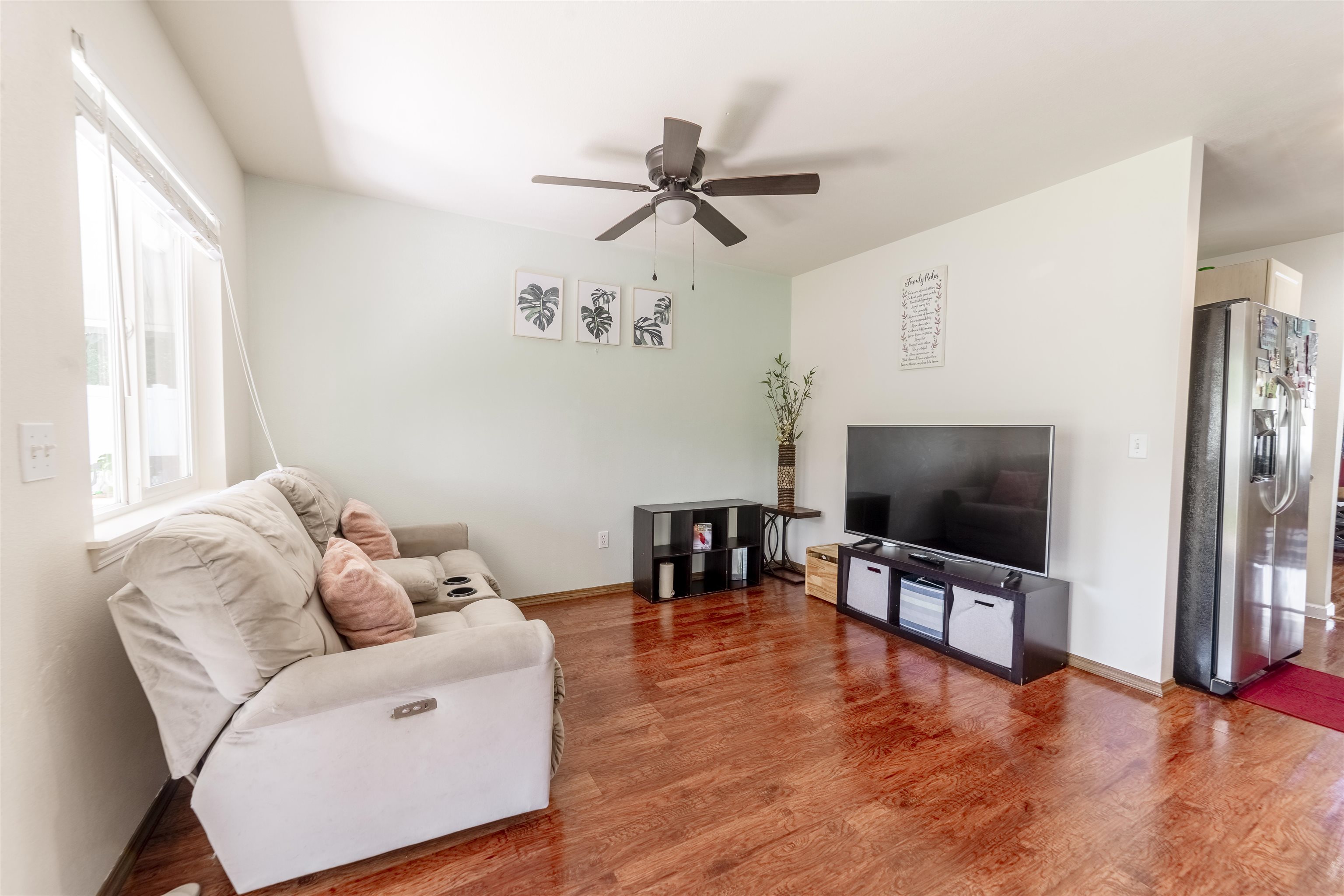 121 Molehulehu Loop Kahului, HI 96732 - Photo 16 of 43 a living room with furniture and a flat screen tv