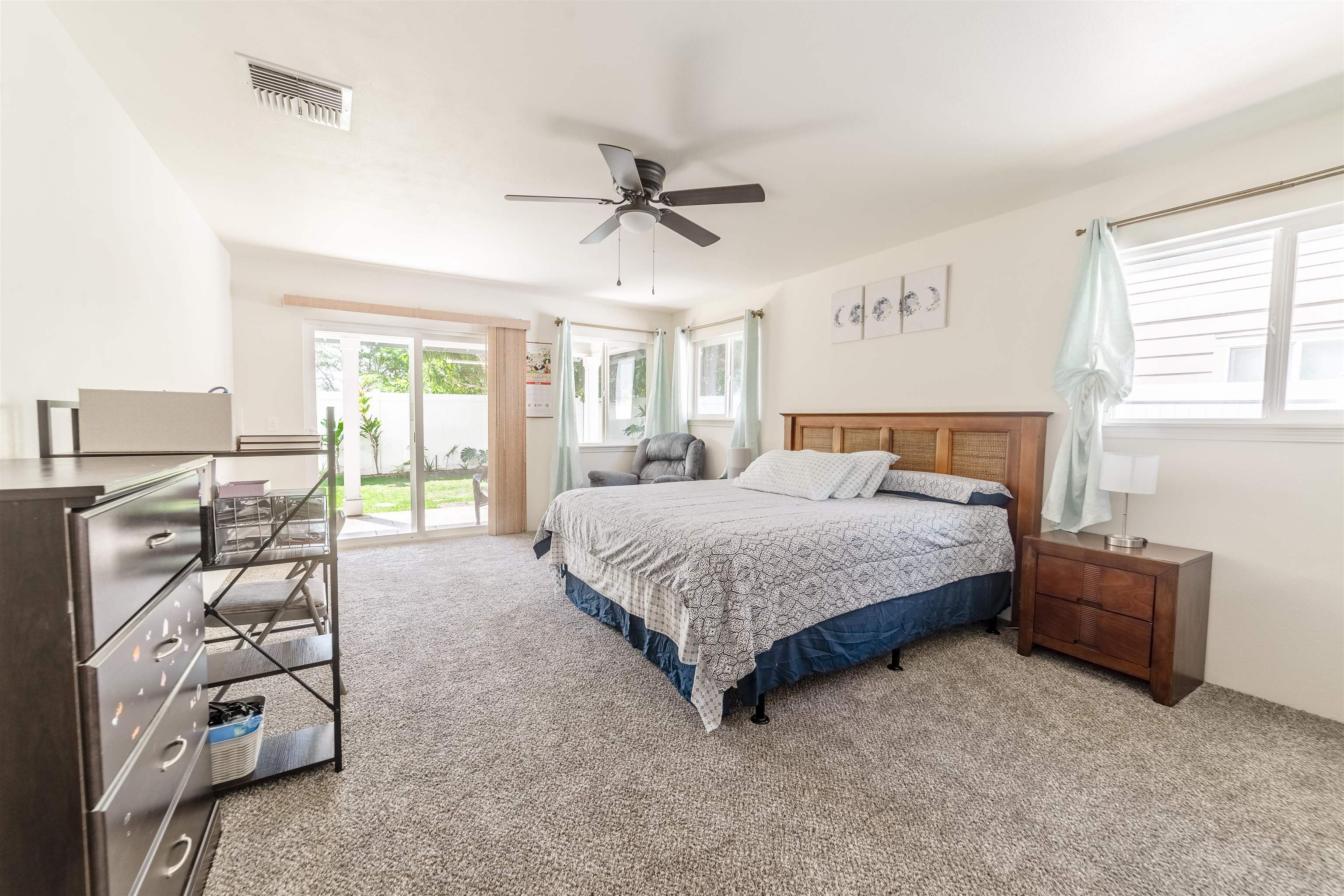 121 Molehulehu Loop Kahului, HI 96732 - Photo 18 of 43 a bedroom with a bed closet and window