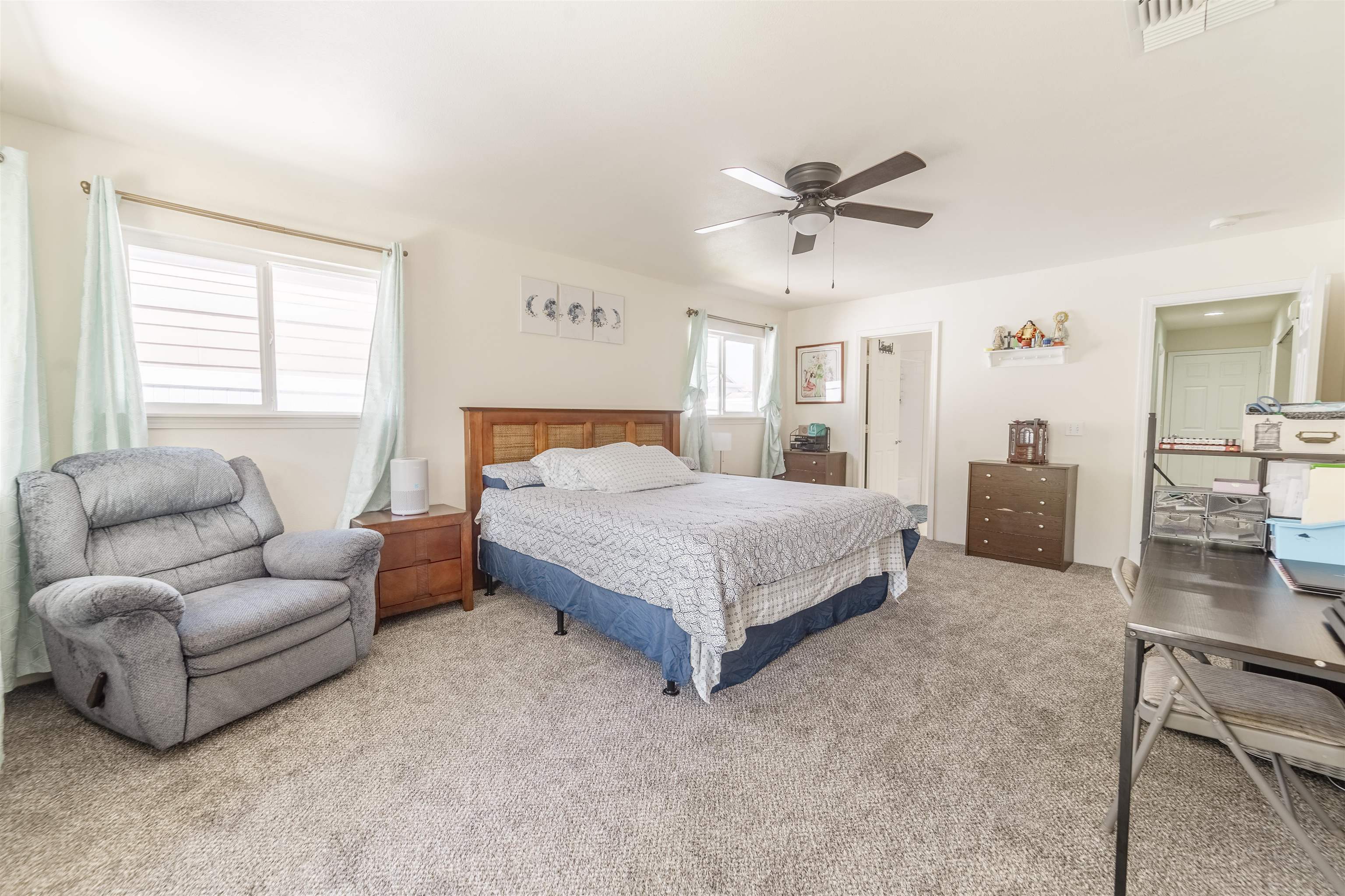 121 Molehulehu Loop Kahului, HI 96732 - Photo 21 of 43 a bedroom with a bed couch and window