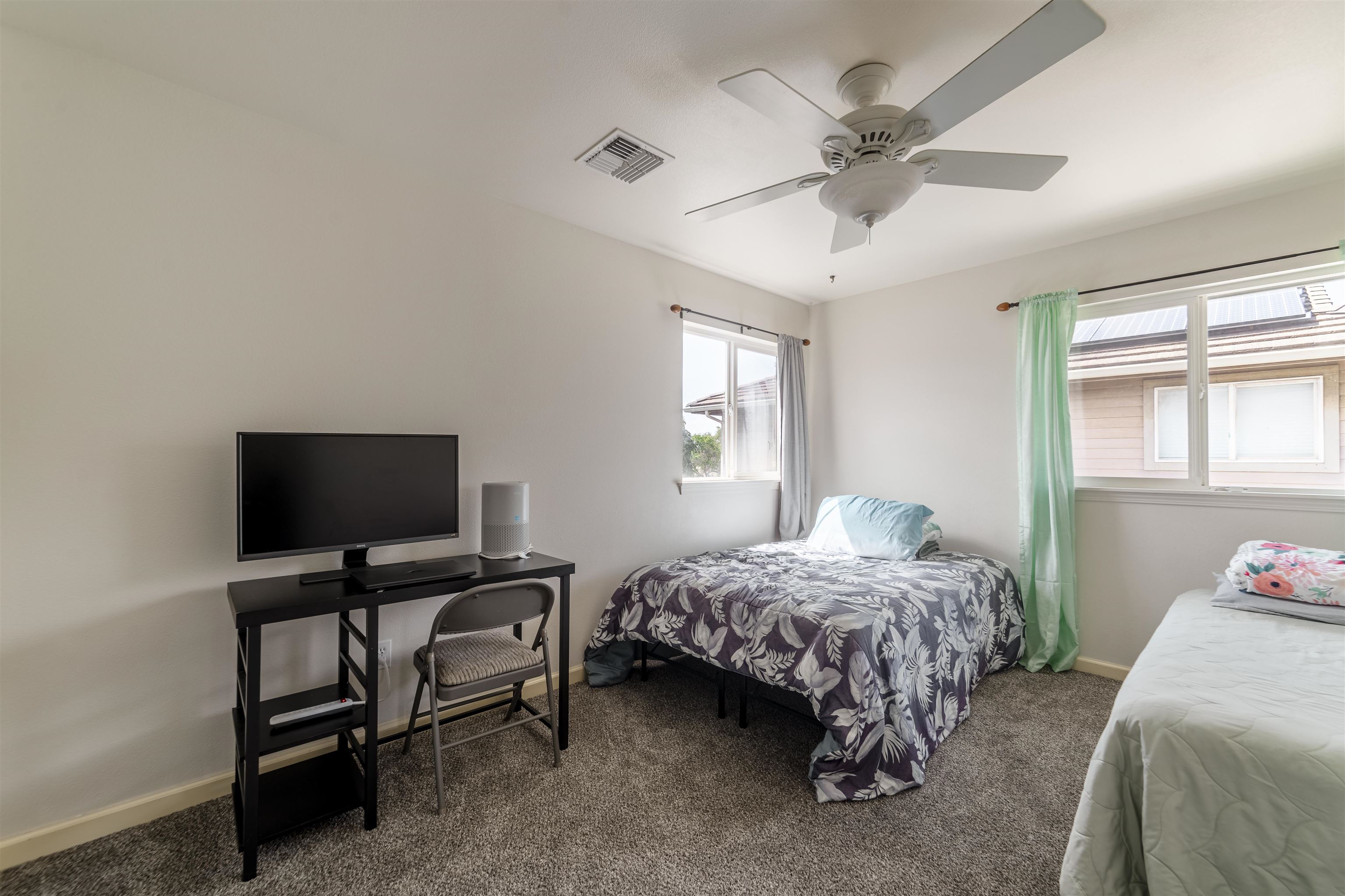 121 Molehulehu Loop Kahului, HI 96732 - Photo 30 of 43 a bedroom with a bed and a window