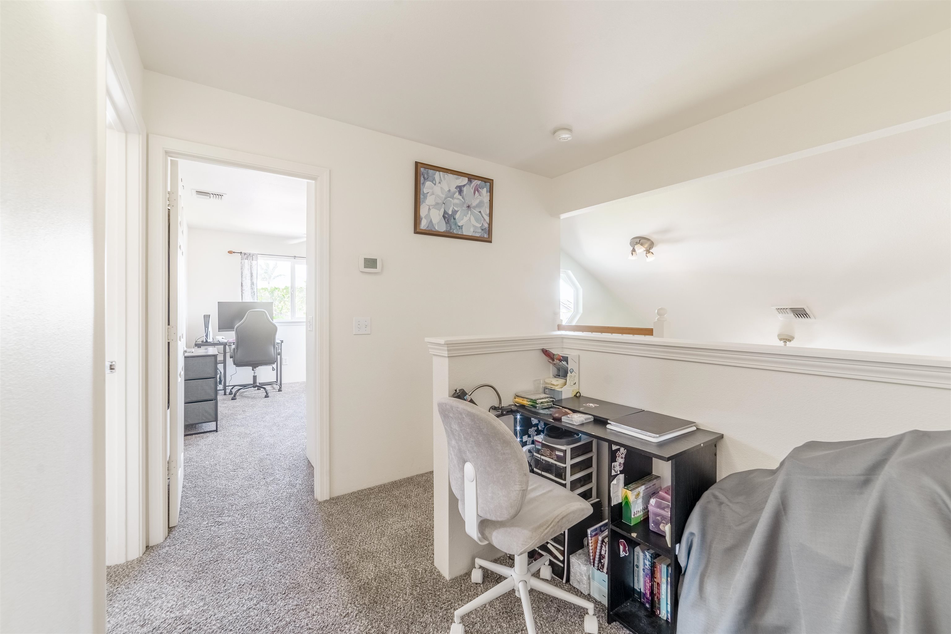 121 Molehulehu Loop Kahului, HI 96732 - Photo 33 of 43 a view of a dining room with furniture and a chandelier