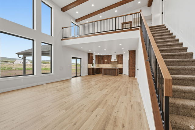 2970 North Mahogany Vly Road Logan, UT 84341 - Photo 5 of 39 Unfurnished living room featuring recessed lighting and light wood-style floors
