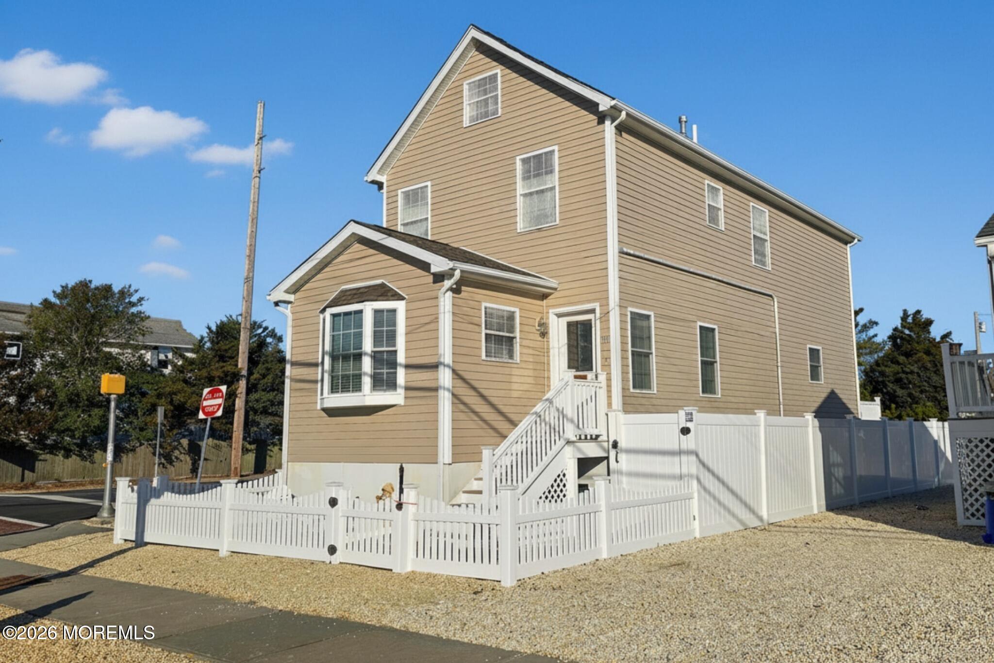 111 President Avenue Lavallette, NJ 08735 - Photo 1 of 54 a view of a house with a yard