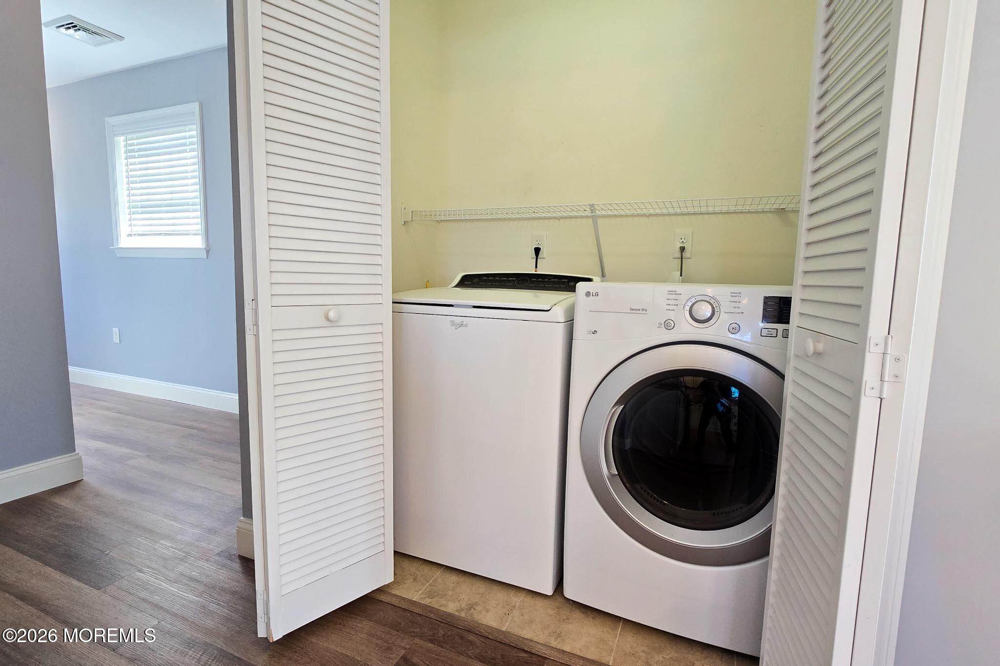 111 President Avenue Lavallette, NJ 08735 - Photo 12 of 54 a view of a hallway with washer and dryer