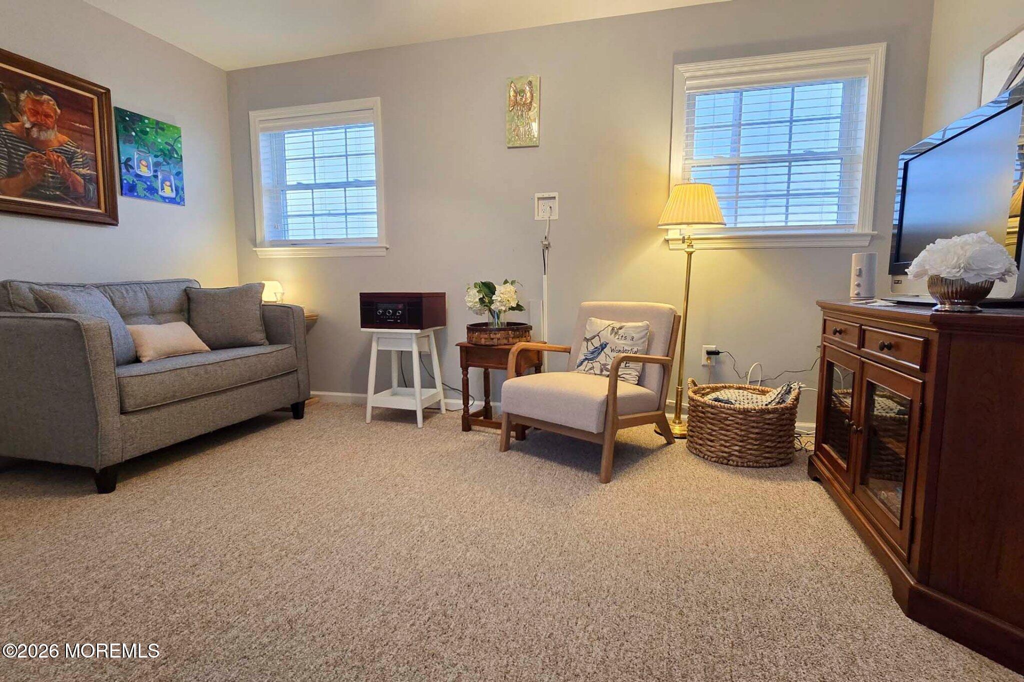 111 President Avenue Lavallette, NJ 08735 - Photo 23 of 54 a living room with furniture and a window