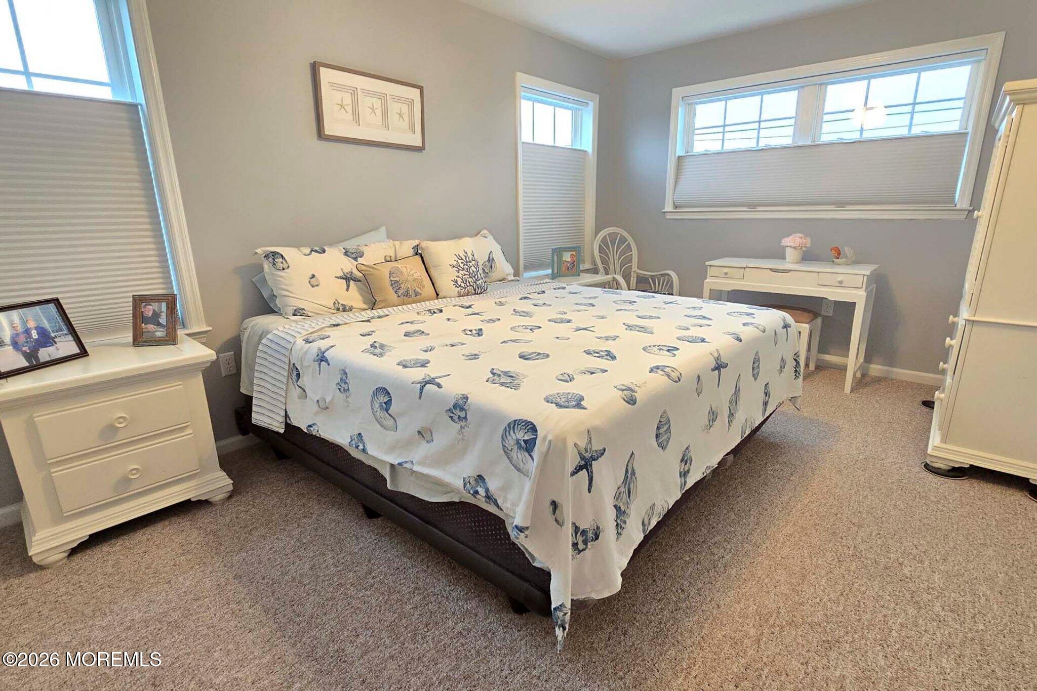 111 President Avenue Lavallette, NJ 08735 - Photo 28 of 54 a bedroom with a bed and a dresser