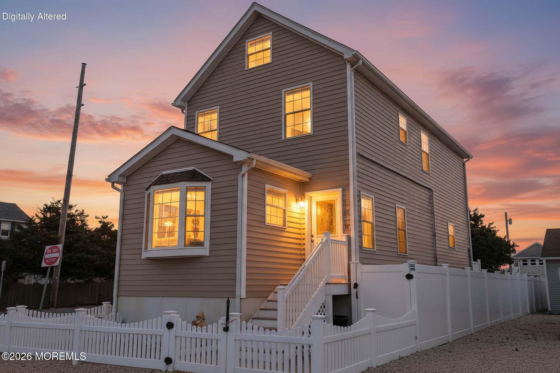 111 President Avenue Lavallette, NJ 08735 - Photo 35 of 54 a front view of a house with a yard